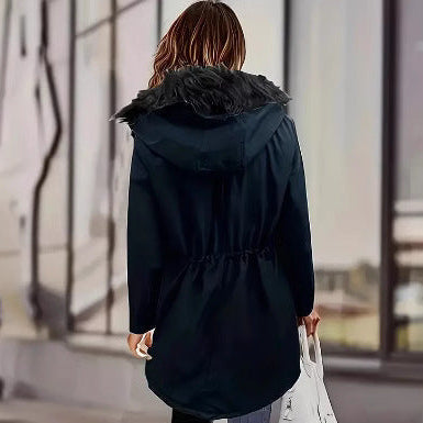 Black winter parka with a detachable faux fur collar and adjustable waist drawstring