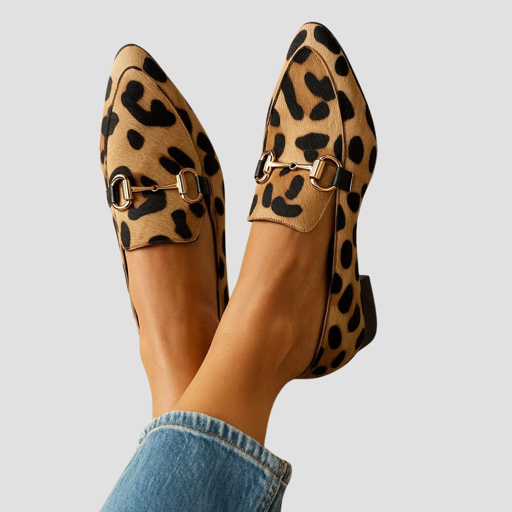 Leopard print loafers in caramel and black with gold tone horsebit hardware