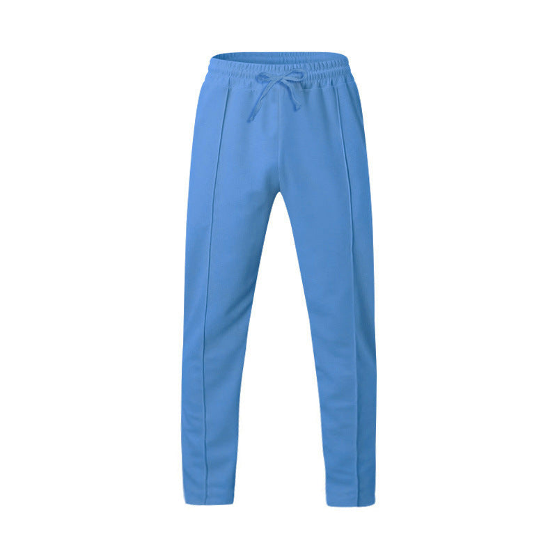 Men's dark grey slim fit joggers with front centre seam and elasticated waistband