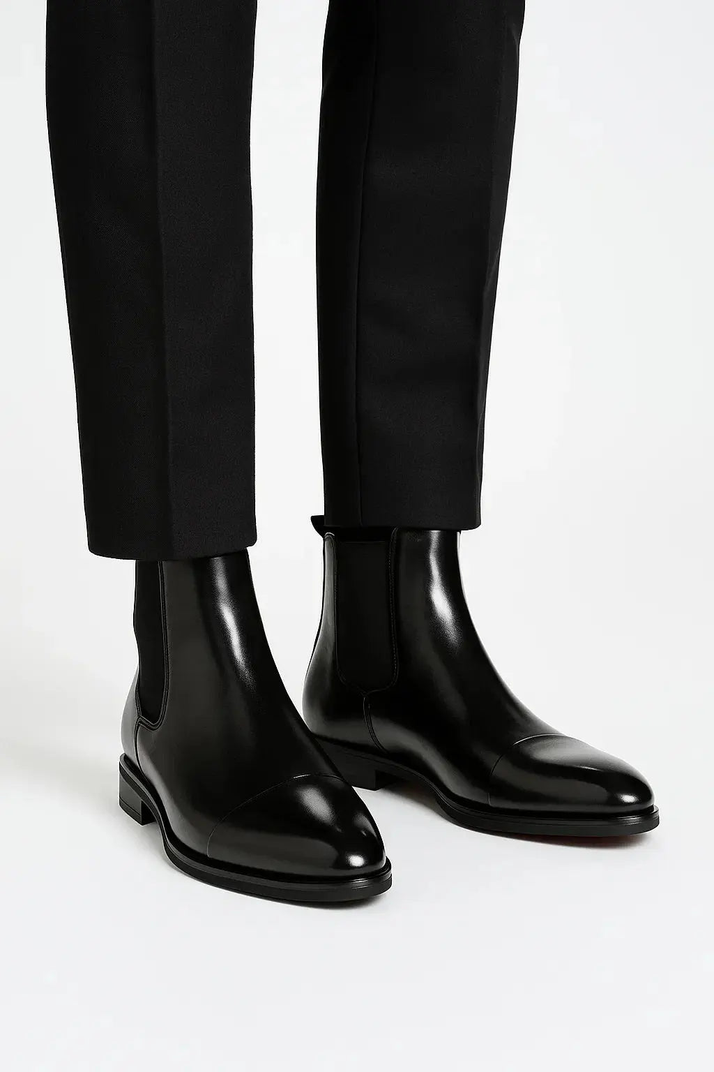 Men's black cap toe Chelsea boots