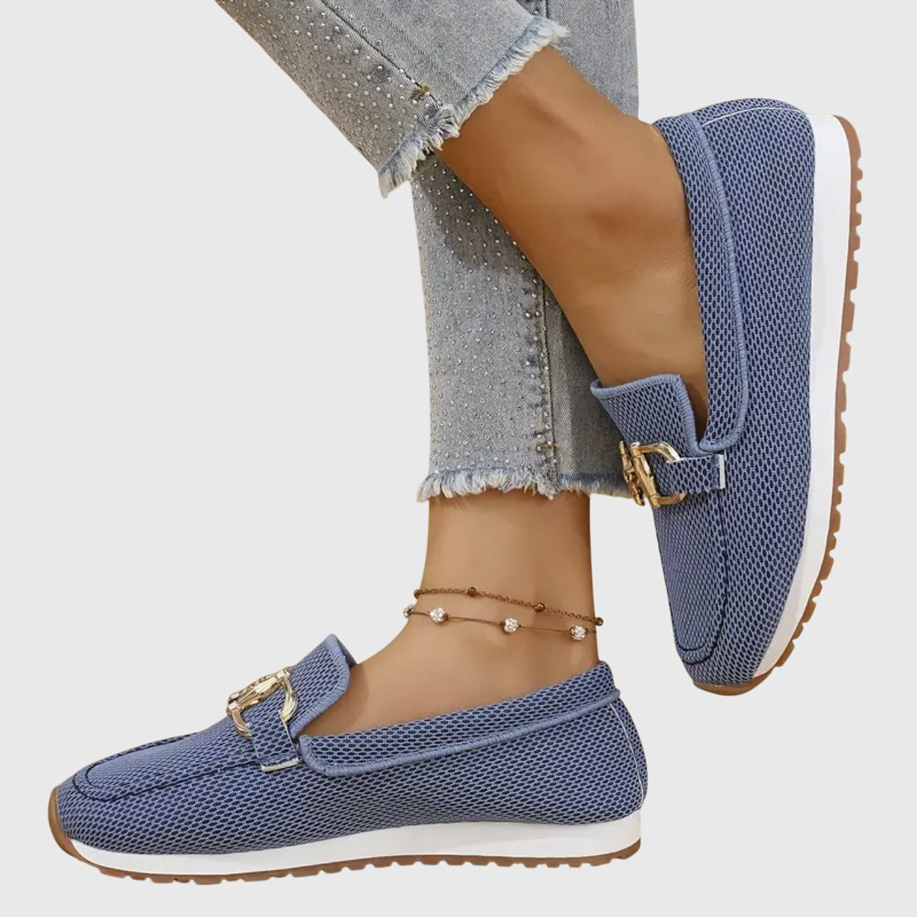 Beige casual slip on loafers with a textured upper and small front hardware detail