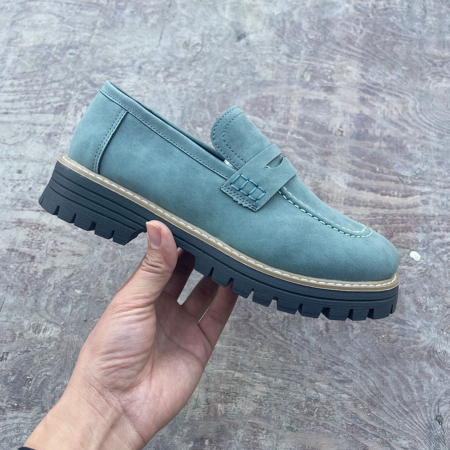 Teal chunky penny loafers with thick profiled sole and keeper strap