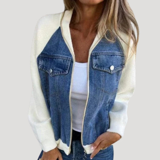 Blue denim bomber jacket with contrasting knit sleeves, chest pockets and front zip