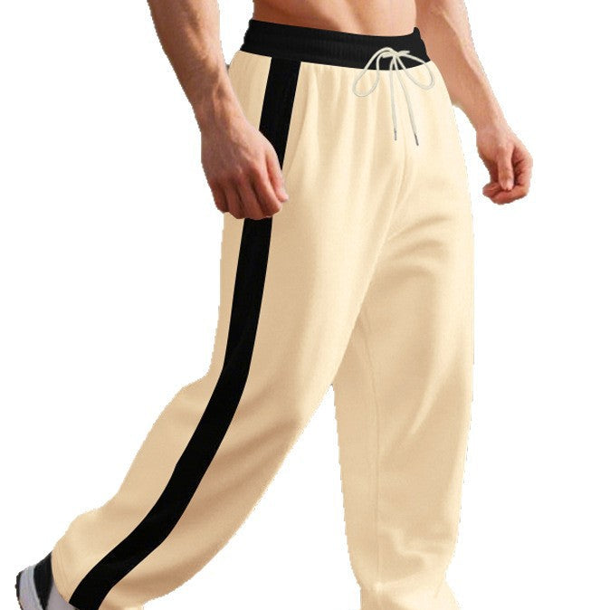 Men's side stripe joggers in black with contrast outer seam stripes and an open hem