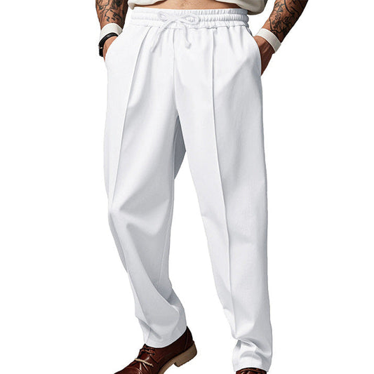 Men's dark grey slim fit joggers with front centre seam and elasticated waistband
