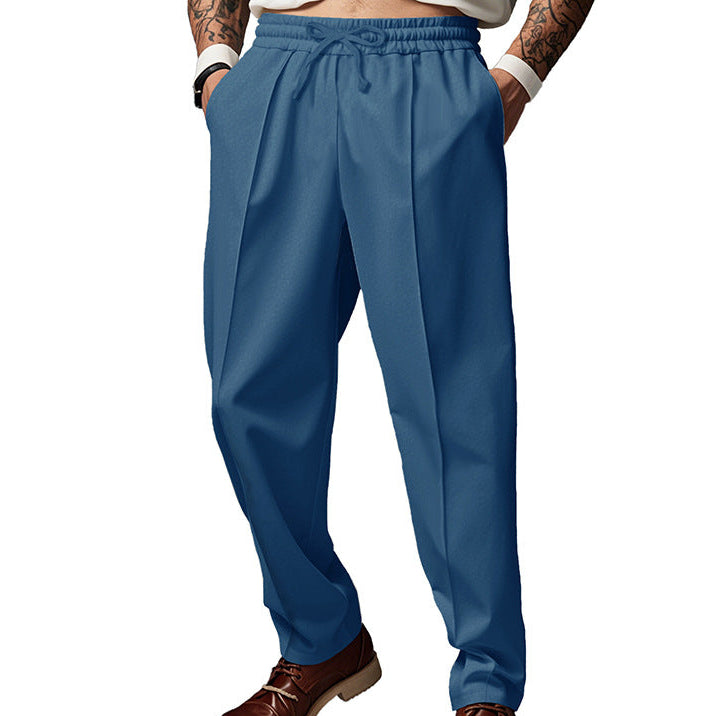 Men's dark grey slim fit joggers with front centre seam and elasticated waistband