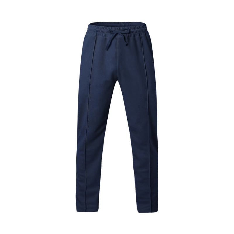 Men's dark grey slim fit joggers with front centre seam and elasticated waistband