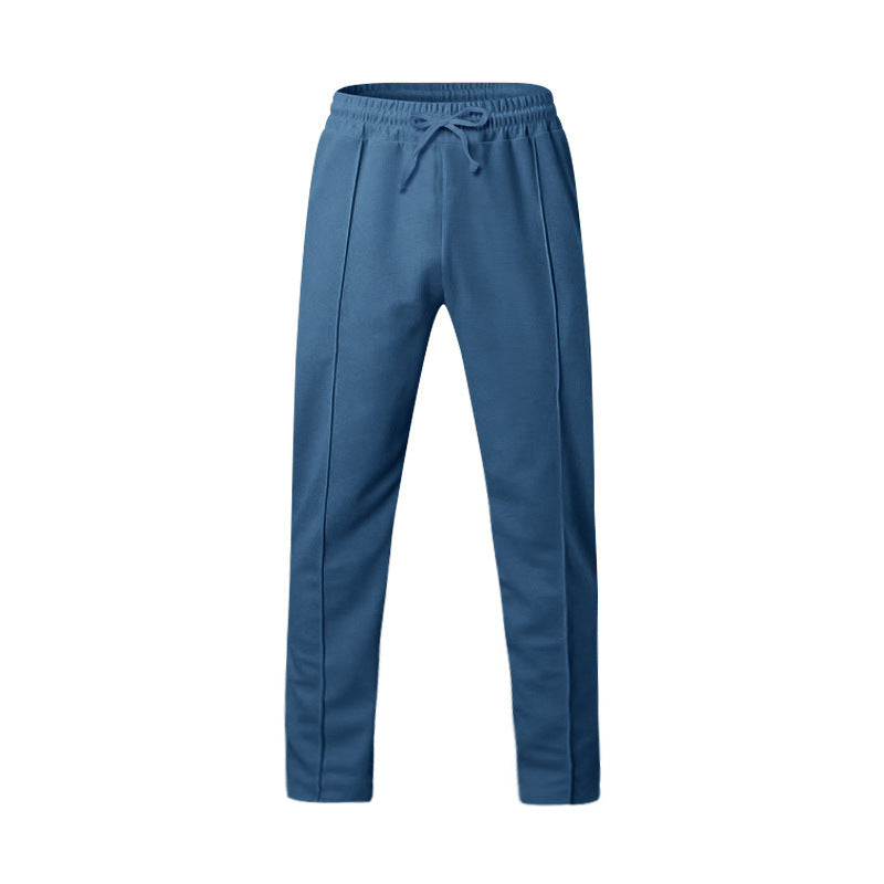 Men's dark grey slim fit joggers with front centre seam and elasticated waistband