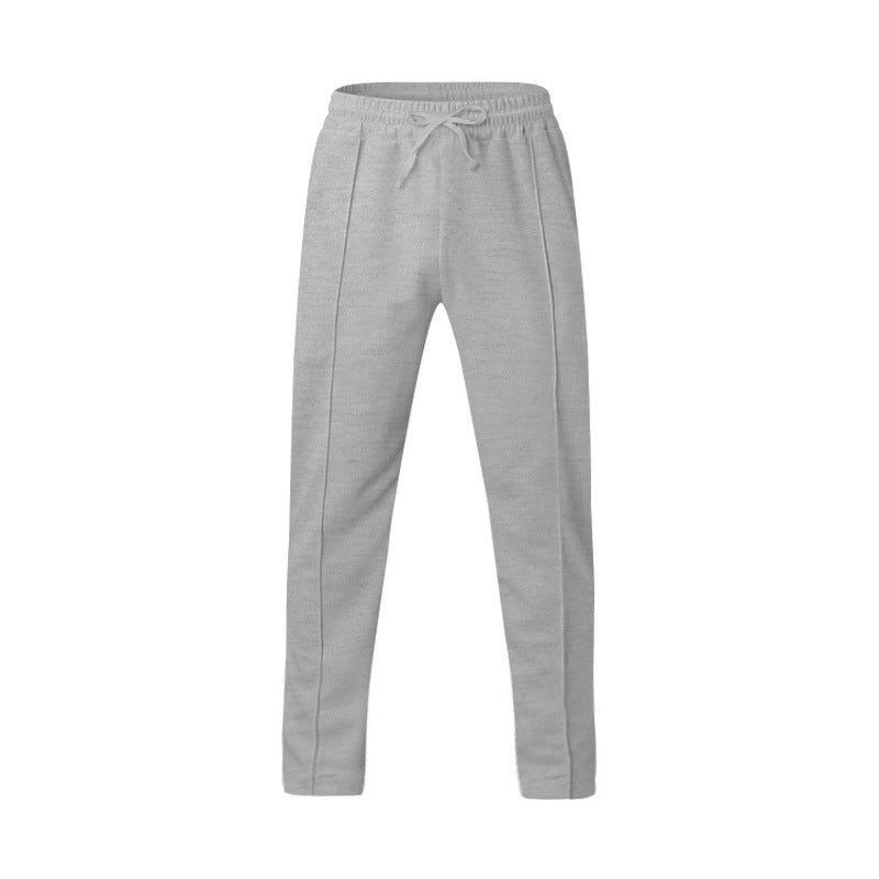 Men's dark grey slim fit joggers with front centre seam and elasticated waistband