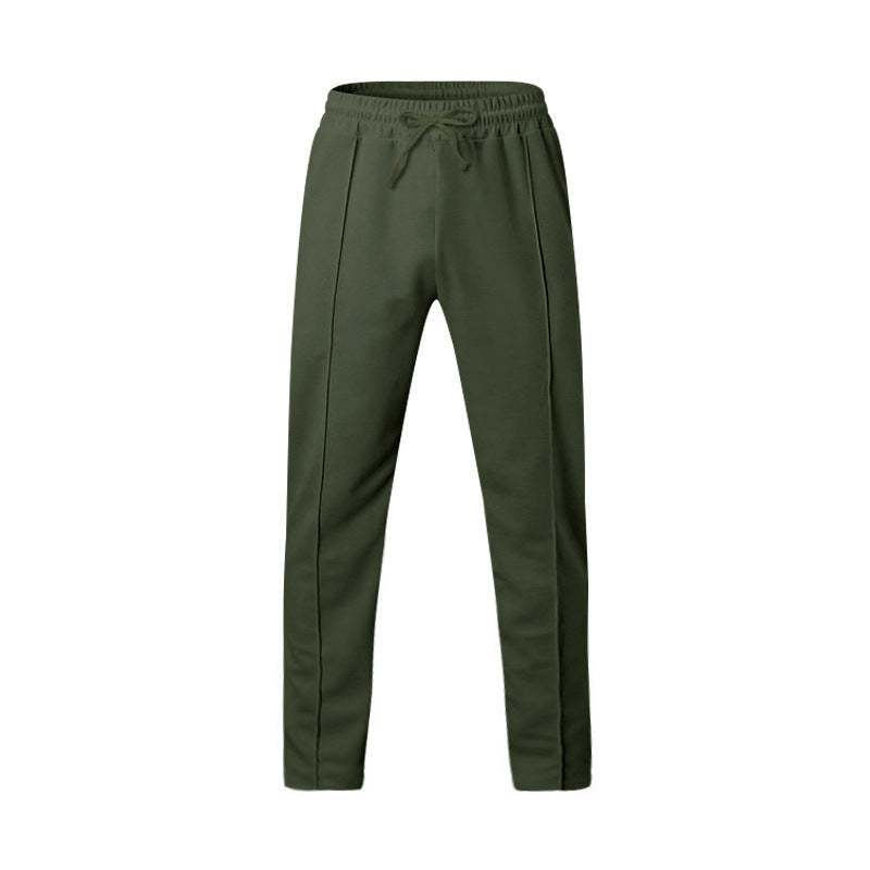 Men's dark grey slim fit joggers with front centre seam and elasticated waistband