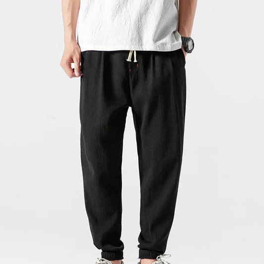 Men's khaki tapered joggers with drawstring waist and ribbed ankle cuffs
