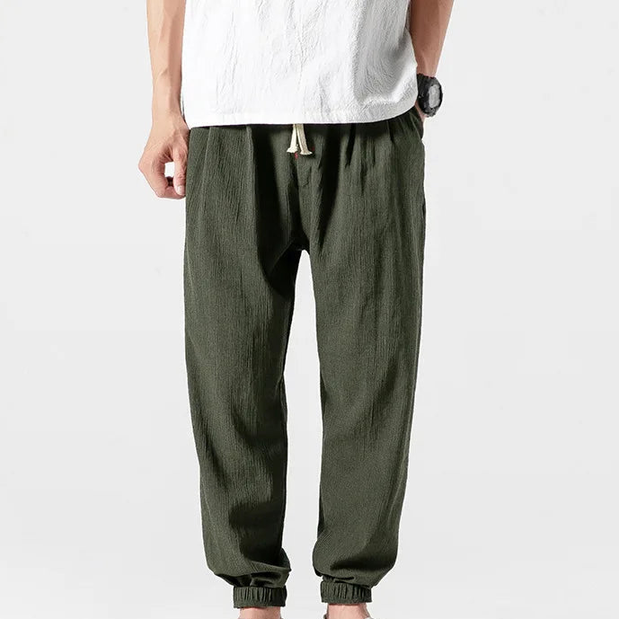 Men's khaki tapered joggers with drawstring waist and ribbed ankle cuffs