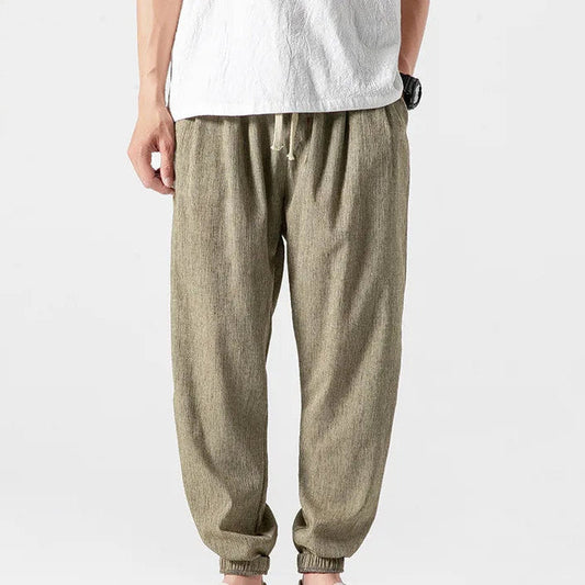 Men's khaki tapered joggers with drawstring waist and ribbed ankle cuffs