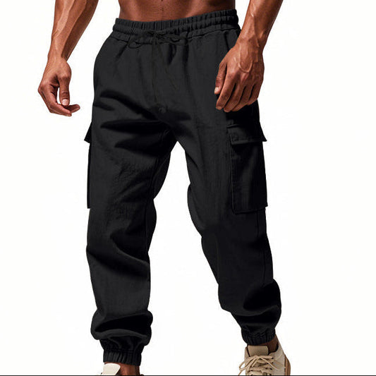 Men's tapered utility joggers in black with flap thigh pockets and elasticated cuffs