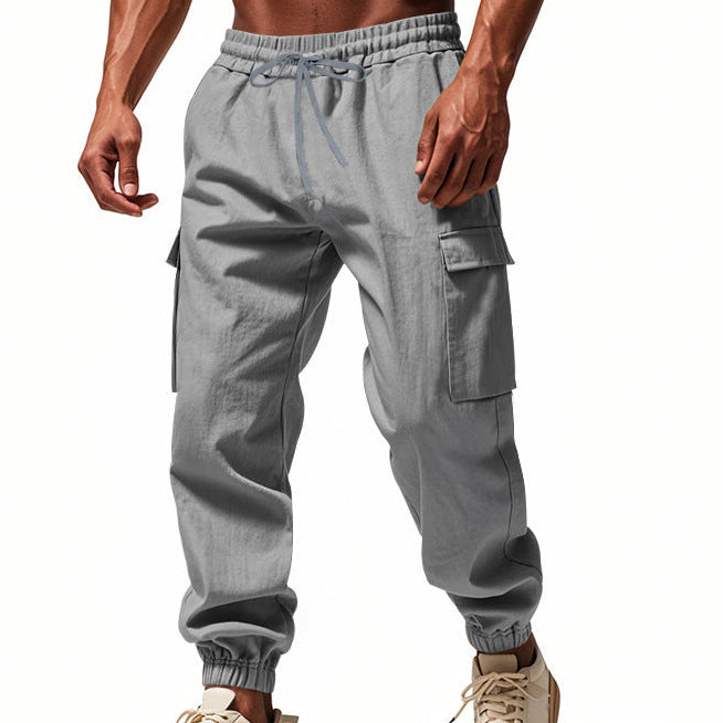 Men's tapered utility joggers in black with flap thigh pockets and elasticated cuffs
