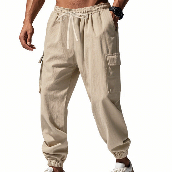 Men's tapered utility joggers in black with flap thigh pockets and elasticated cuffs