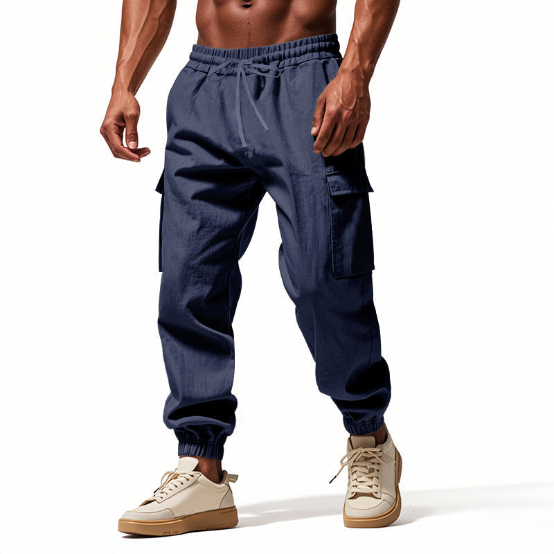 Men's tapered utility joggers in black with flap thigh pockets and elasticated cuffs