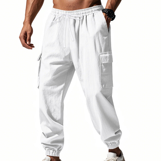 Men's tapered utility joggers in black with flap thigh pockets and elasticated cuffs