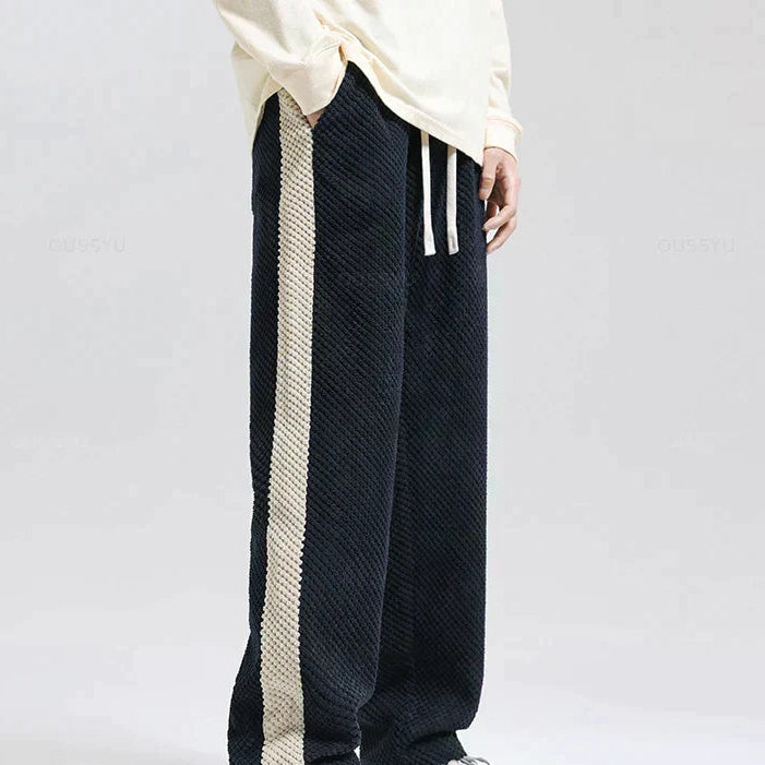 Men's waffle knit joggers in grey with contrast side stripes and drawstring waist