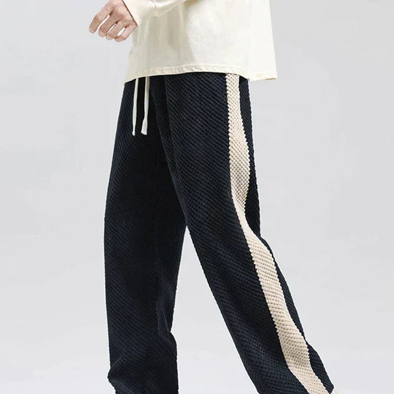 Men's waffle knit joggers in grey with contrast side stripes and drawstring waist