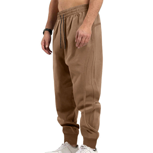 Men's zip pocket joggers in dark grey with concealed side zips and ribbed ankle cuffs