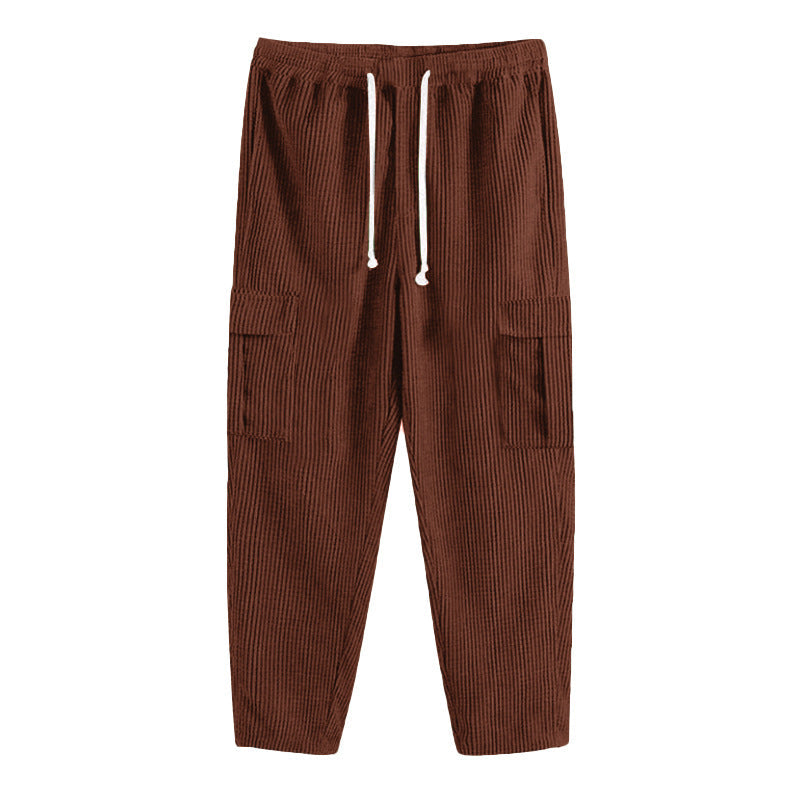 Men's relaxed corduroy joggers in brick red with patch flap pockets and a straight leg
