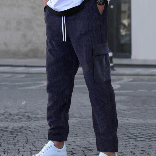 Men's relaxed corduroy joggers in brick red with patch flap pockets and a straight leg