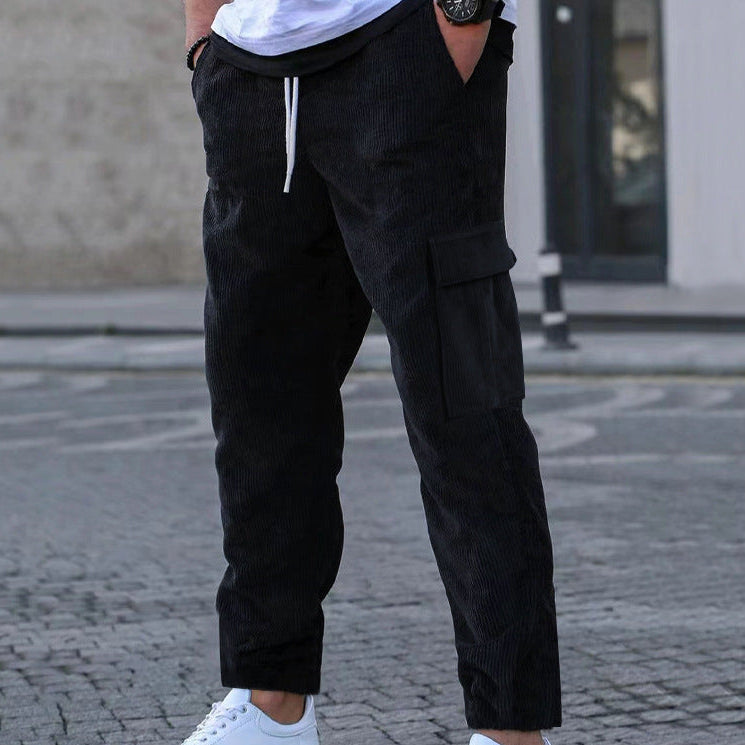 Men's relaxed corduroy joggers in brick red with patch flap pockets and a straight leg