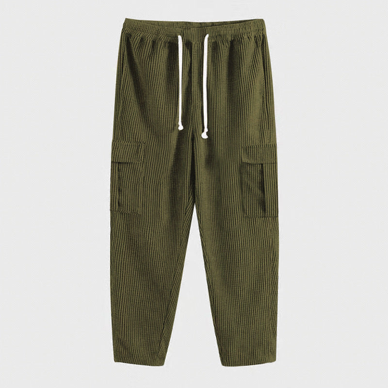 Men's relaxed corduroy joggers in brick red with patch flap pockets and a straight leg