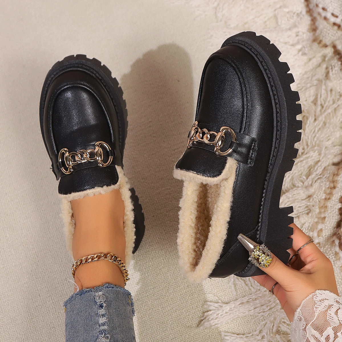 Black leather sherpa lined loafers with chunky lug sole