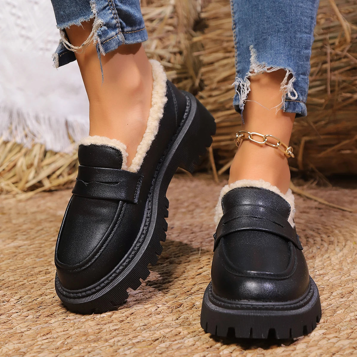 Black leather sherpa lined loafers with chunky lug sole