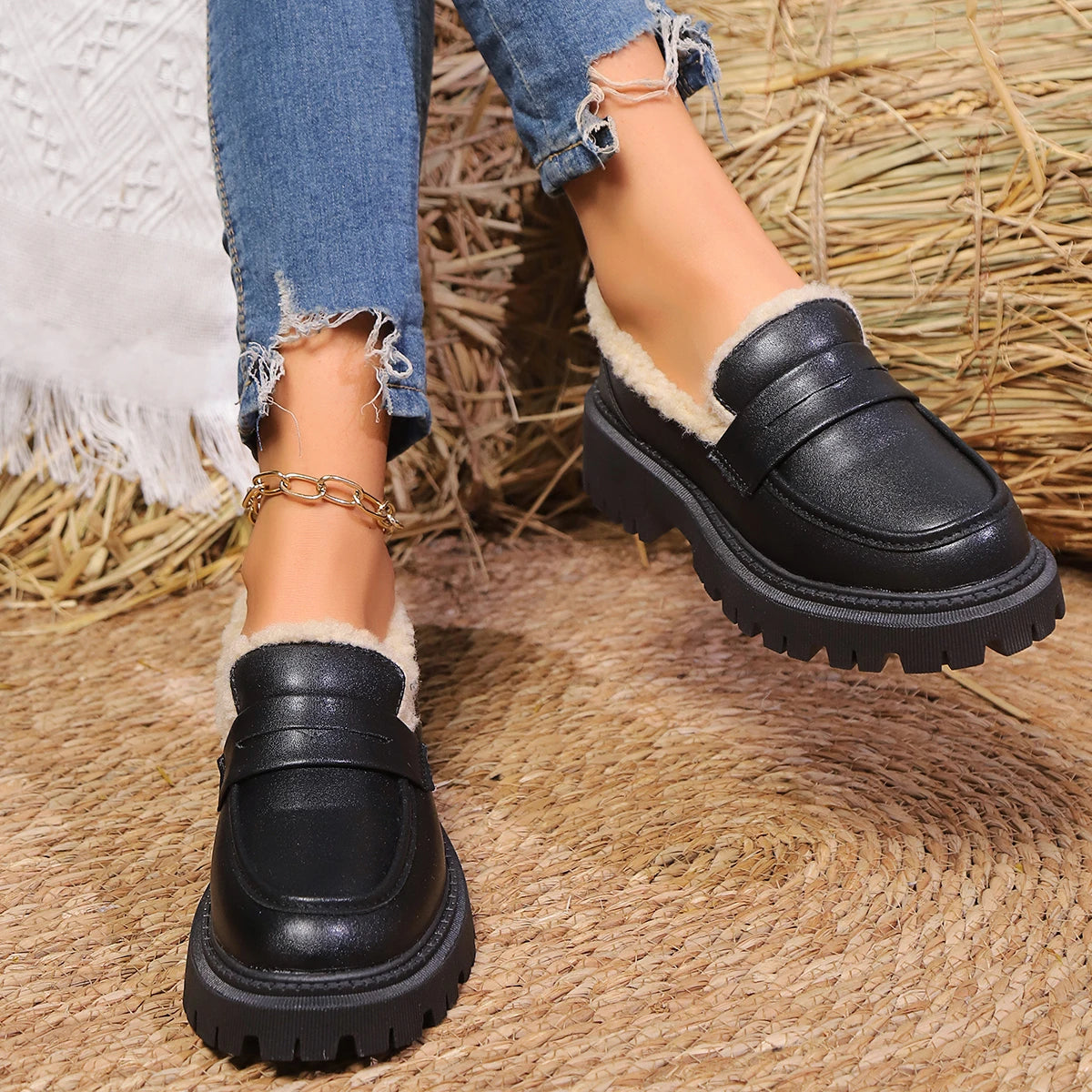 Black leather sherpa lined loafers with chunky lug sole