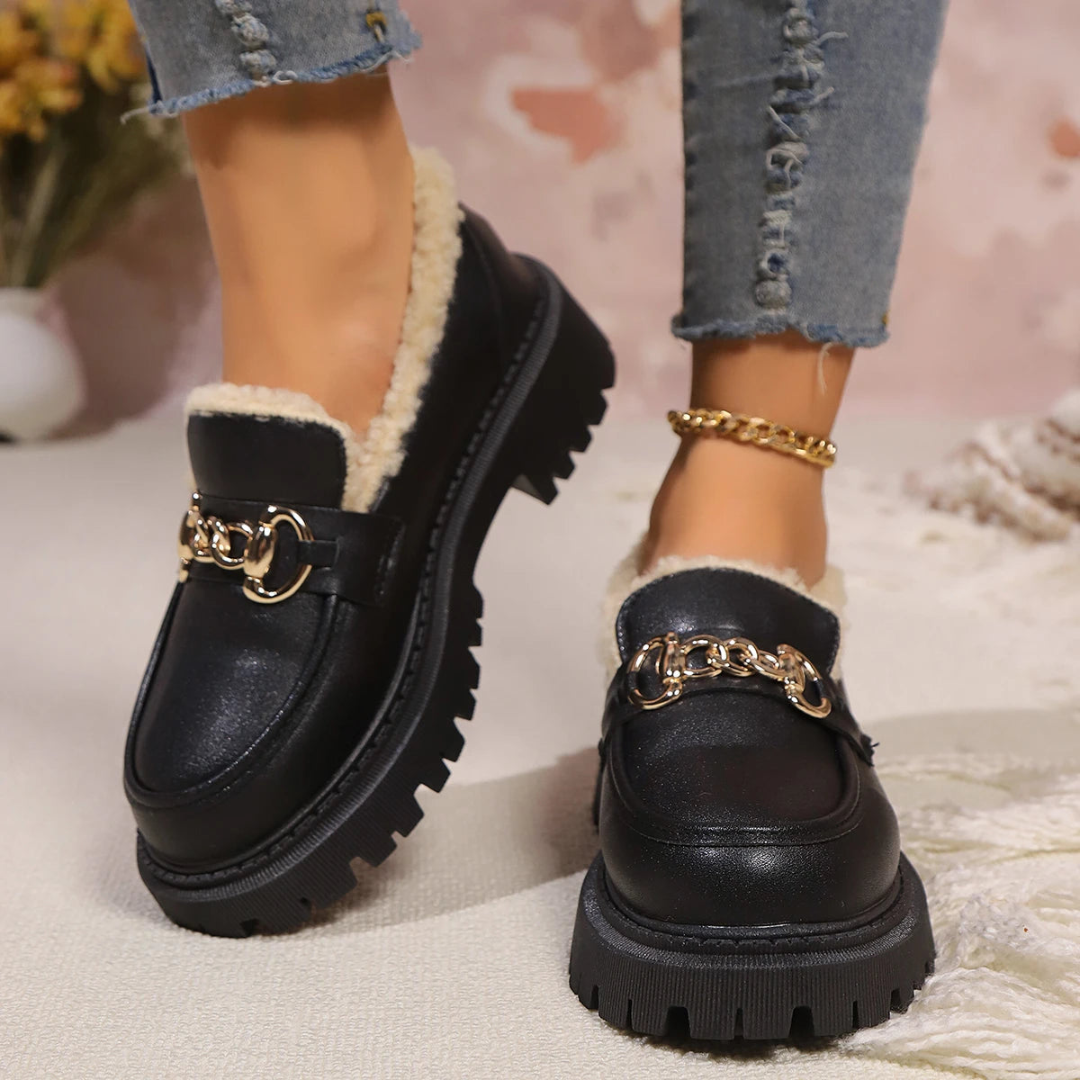 Black leather sherpa lined loafers with chunky lug sole