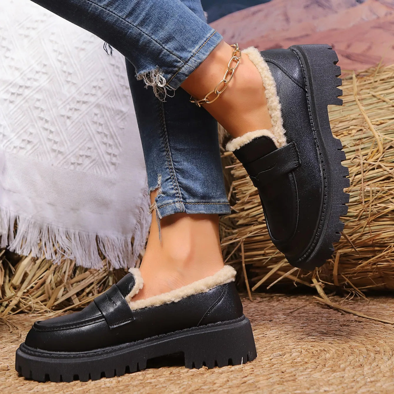 Black leather sherpa lined loafers with chunky lug sole