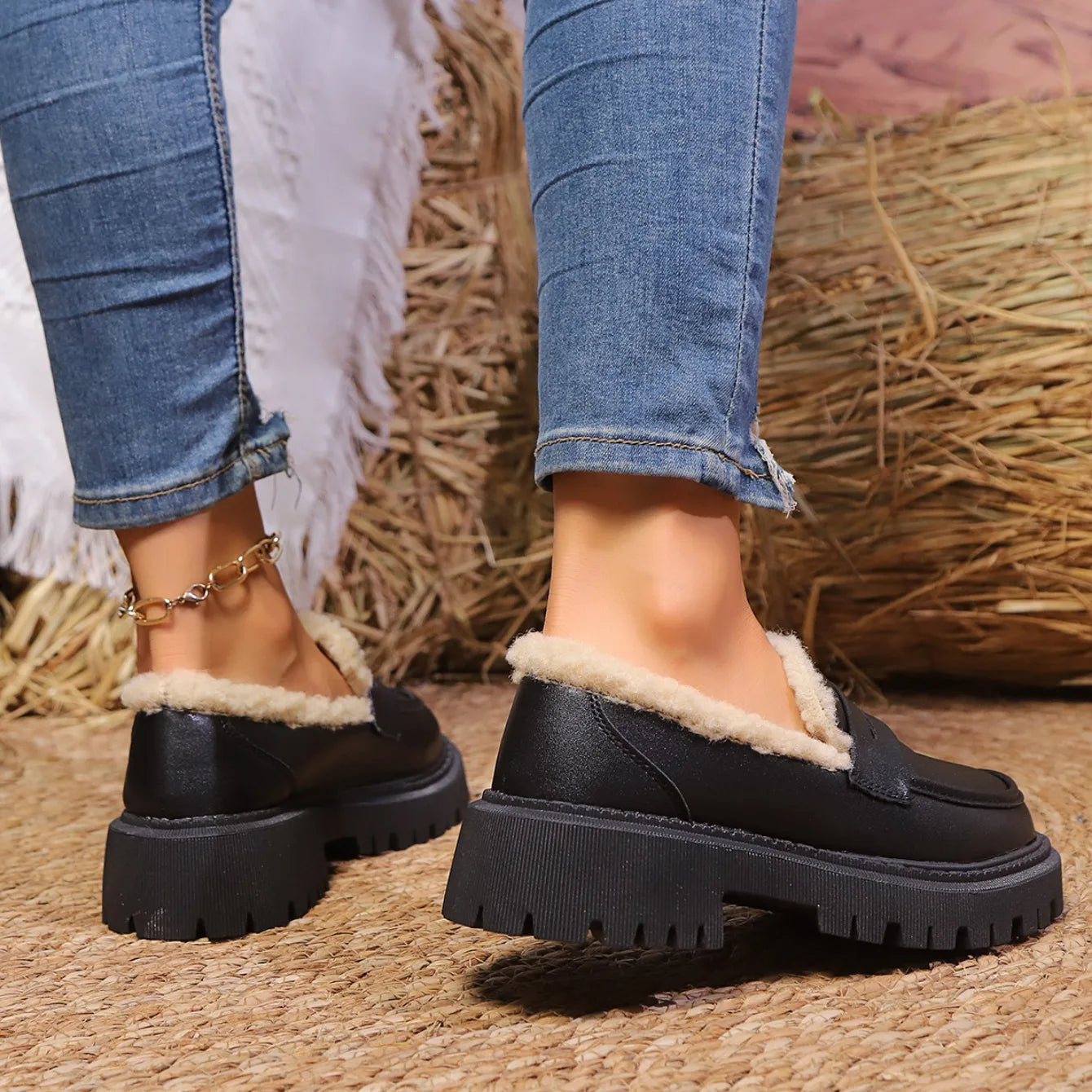 Black leather sherpa lined loafers with chunky lug sole