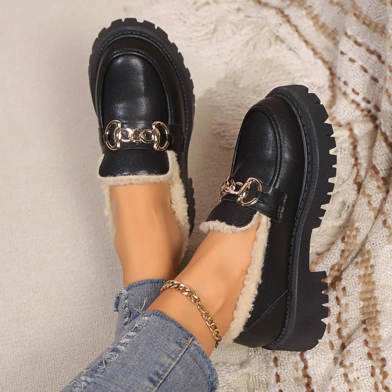 Black leather sherpa lined loafers with chunky lug sole