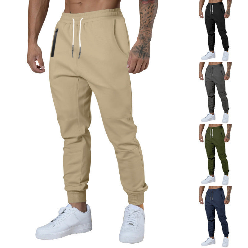 Men's black sporty joggers with functional side pockets and drawstring waistband