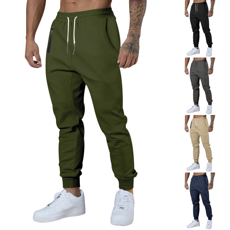 Men's black sporty joggers with functional side pockets and drawstring waistband