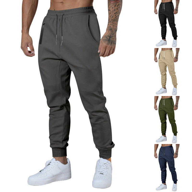 Men's black sporty joggers with functional side pockets and drawstring waistband