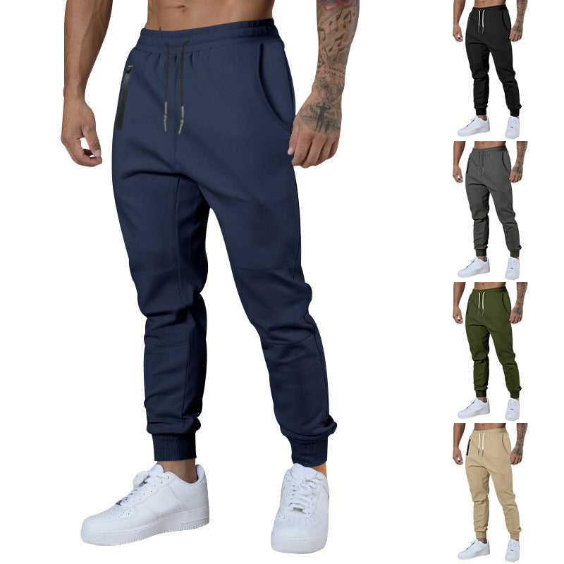 Men's black sporty joggers with functional side pockets and drawstring waistband