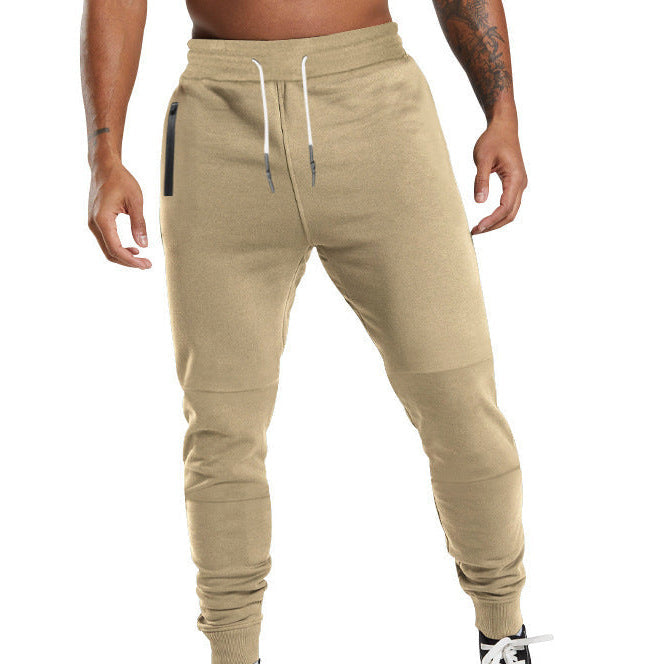 Men's black sporty joggers with functional side pockets and drawstring waistband