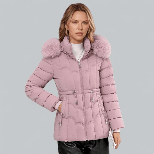 Pink tailored quilted parka with a faux fur hood and mid length cut