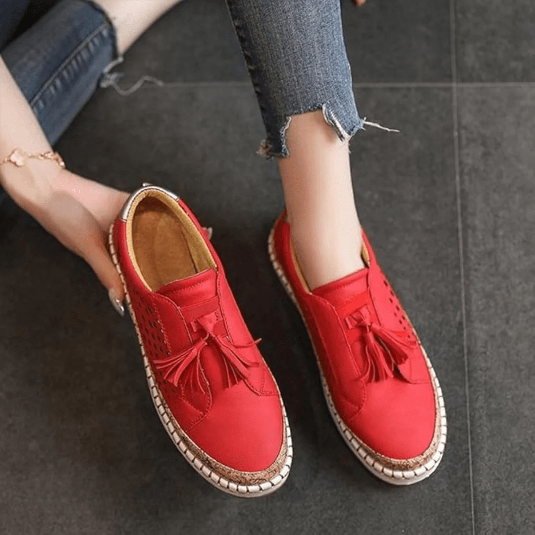 Green textured slip on loafers with reinforced stitching and a low flat sole