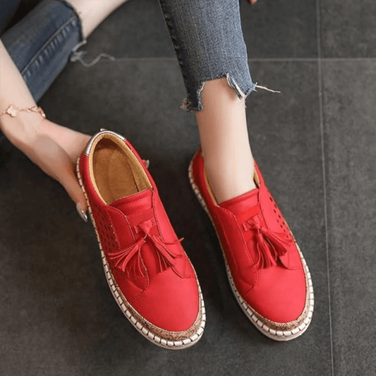 Green textured slip on loafers with reinforced stitching and a low flat sole