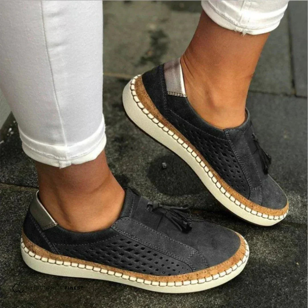 Green textured slip on loafers with reinforced stitching and a low flat sole