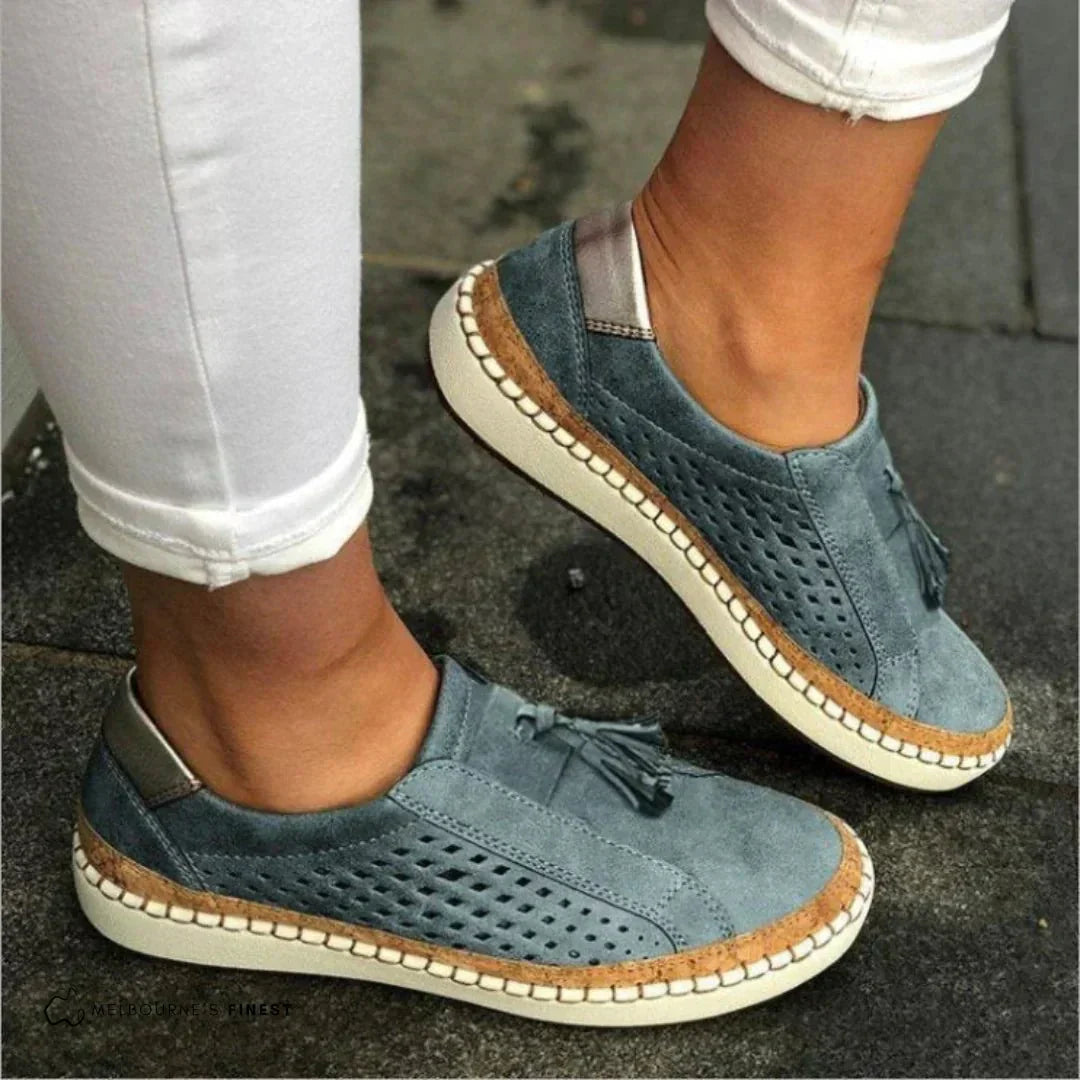 Green textured slip on loafers with reinforced stitching and a low flat sole