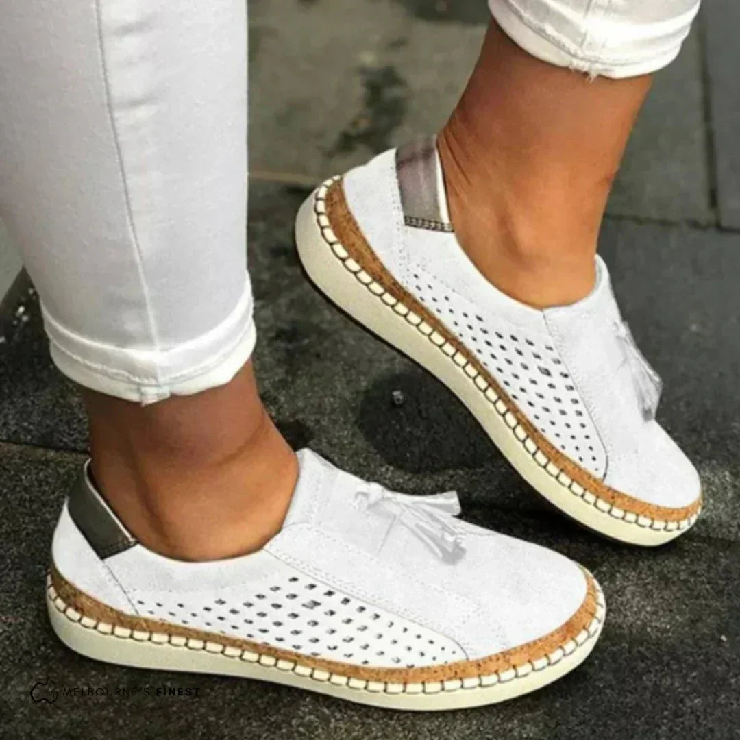 Green textured slip on loafers with reinforced stitching and a low flat sole