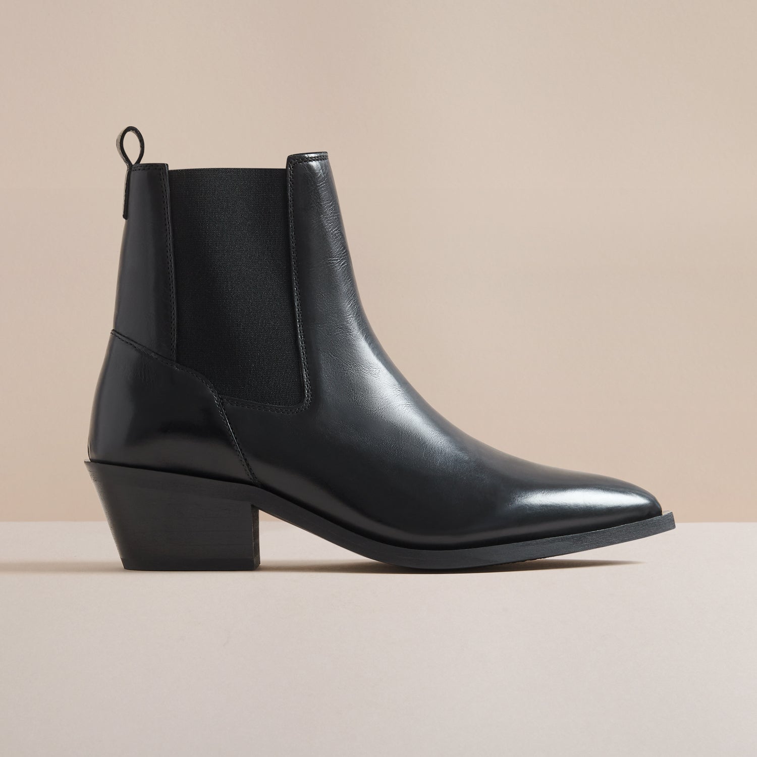 Pointed western Chelsea boots in black, side view