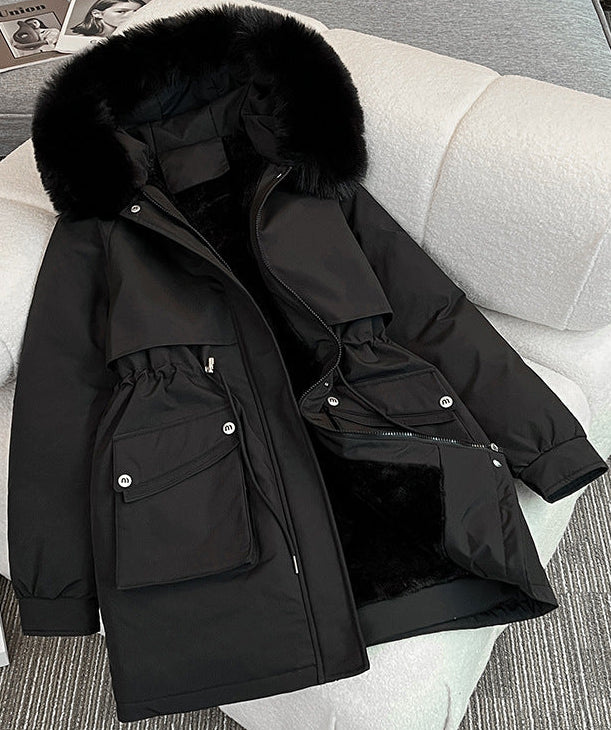 Black water repellent winter parka with an adjustable faux fur trimmed hood and large side pockets