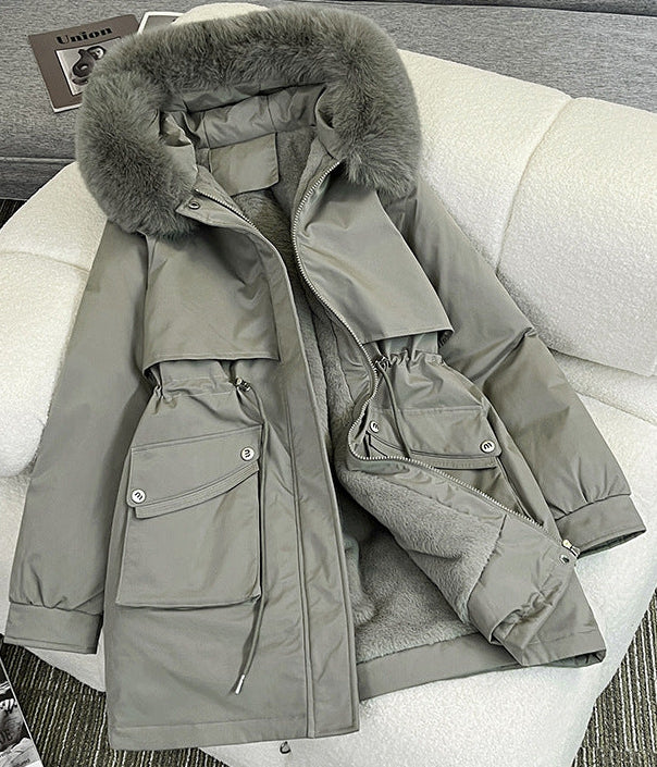 Black water repellent winter parka with an adjustable faux fur trimmed hood and large side pockets